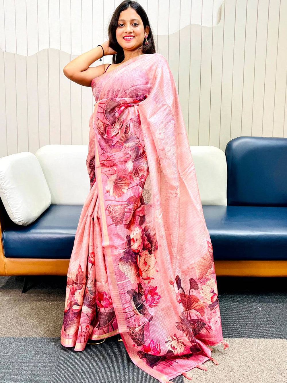 Model posing in pink floral print Kota Doriya silk saree