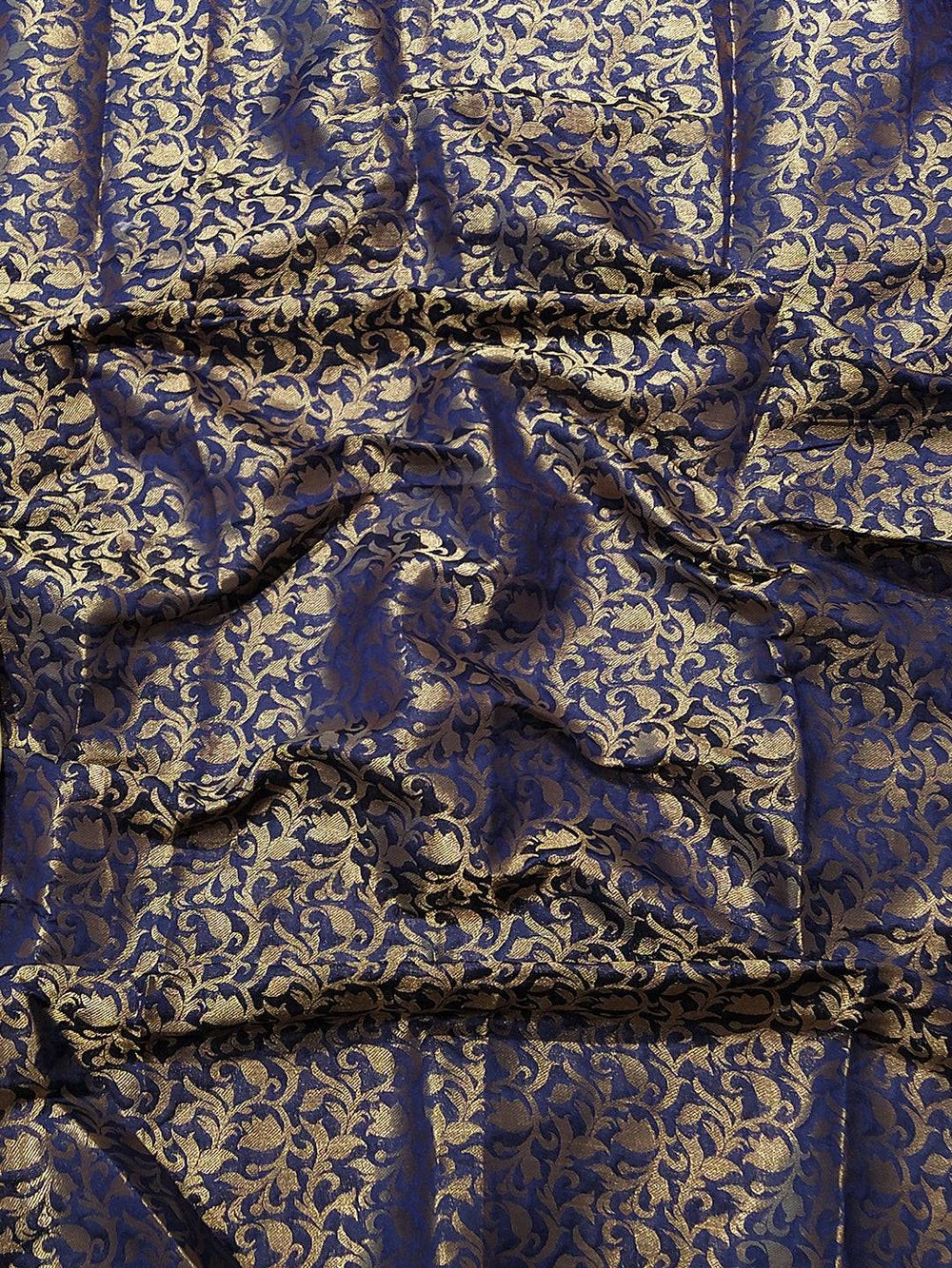 Close-up of intricate Kanjivaram weaving on Rani Colour Saree