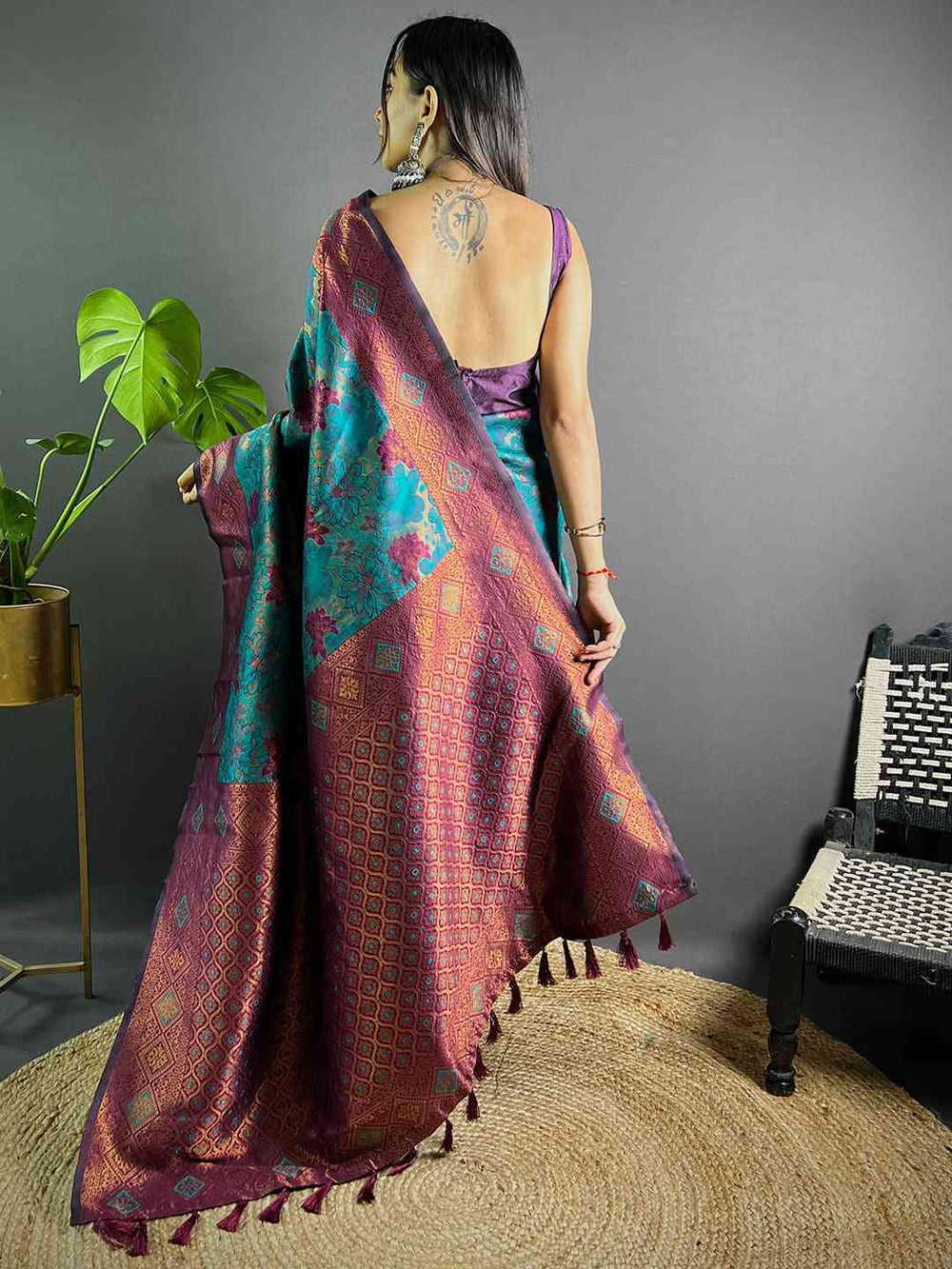 Back view of Teal Soft Silk Butta Weaving Saree with intricate design