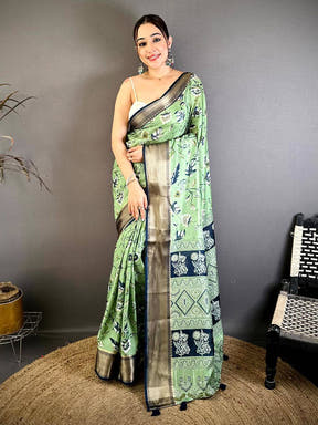 Pista Soft Dola Silk Floral Kanchi Border Saree