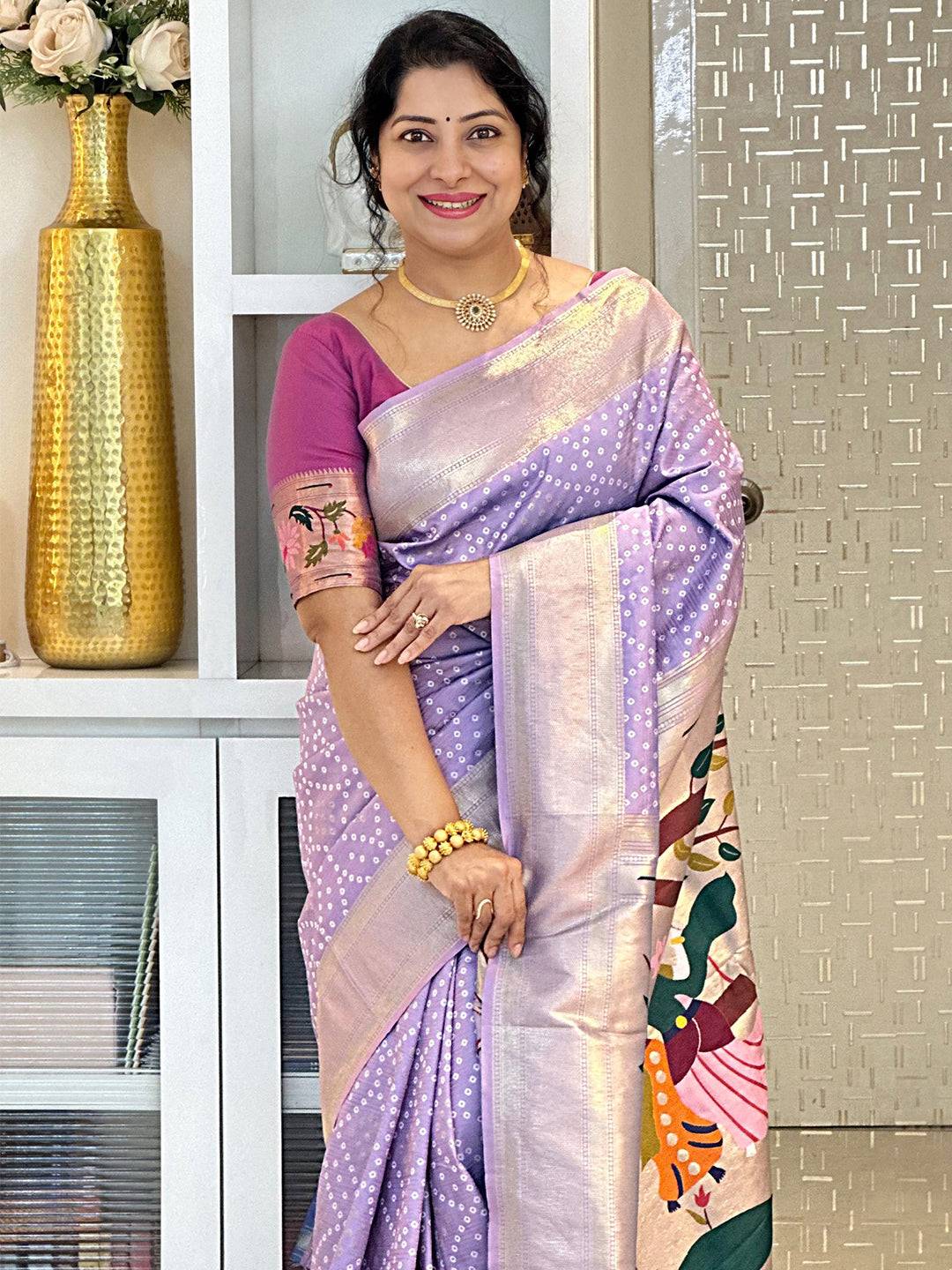Stylish lavender Bandhej saree with exquisite silk texture.