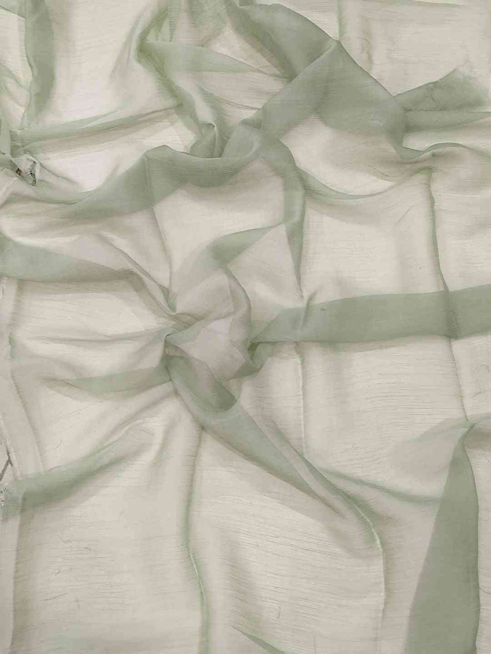 Soft chiffon satin fabric in light green shade.