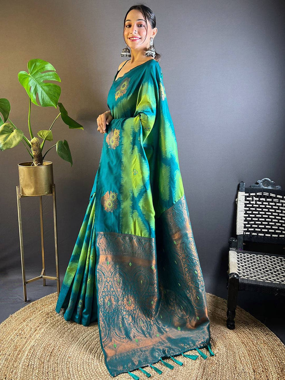 Side view of Parrot Green Tussar Silk Ikkat Weaving Saree.