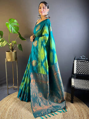Side view of Parrot Green Tussar Silk Ikkat Weaving Saree.