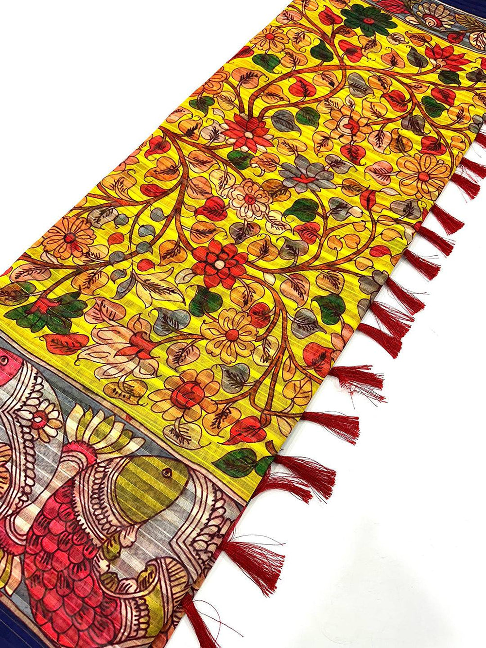 Detailed floral and fish design on Kalamkari saree