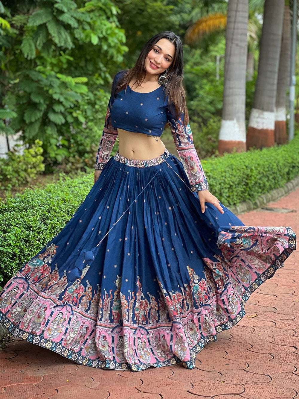 Model posing in Admiral Blue Kalamkari Lehenga