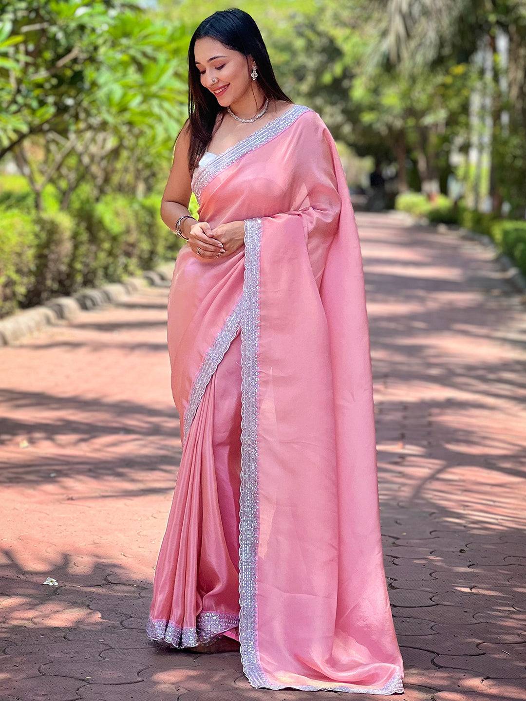 Elegant pink viscose saree with sequence cut work border