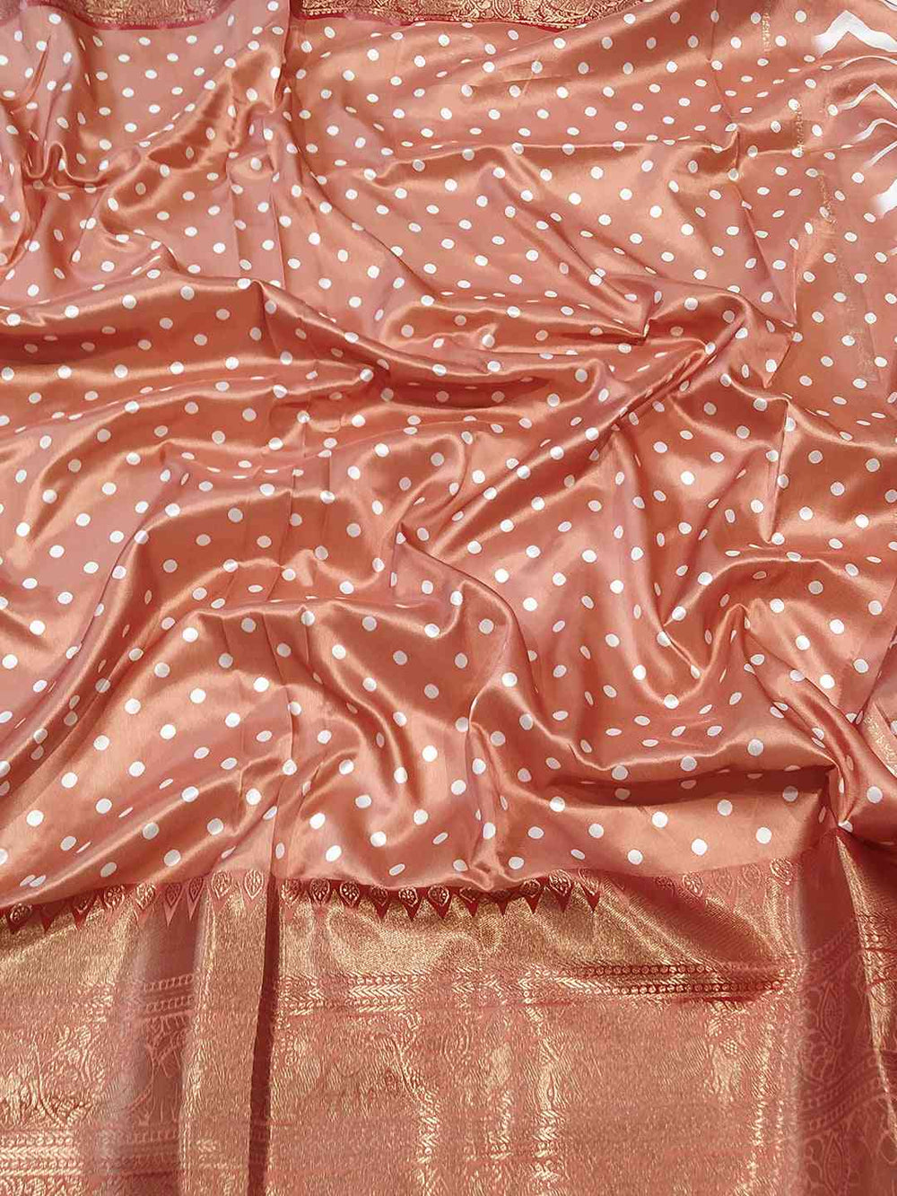 Close-up of Kanchi Zari Border Saree with polka dot pattern