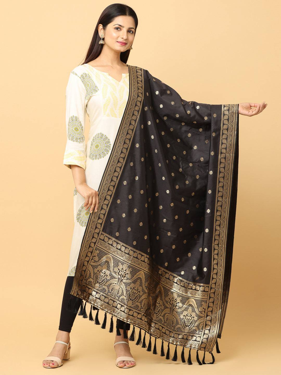 Model wearing woven design silk blend black dupatta.