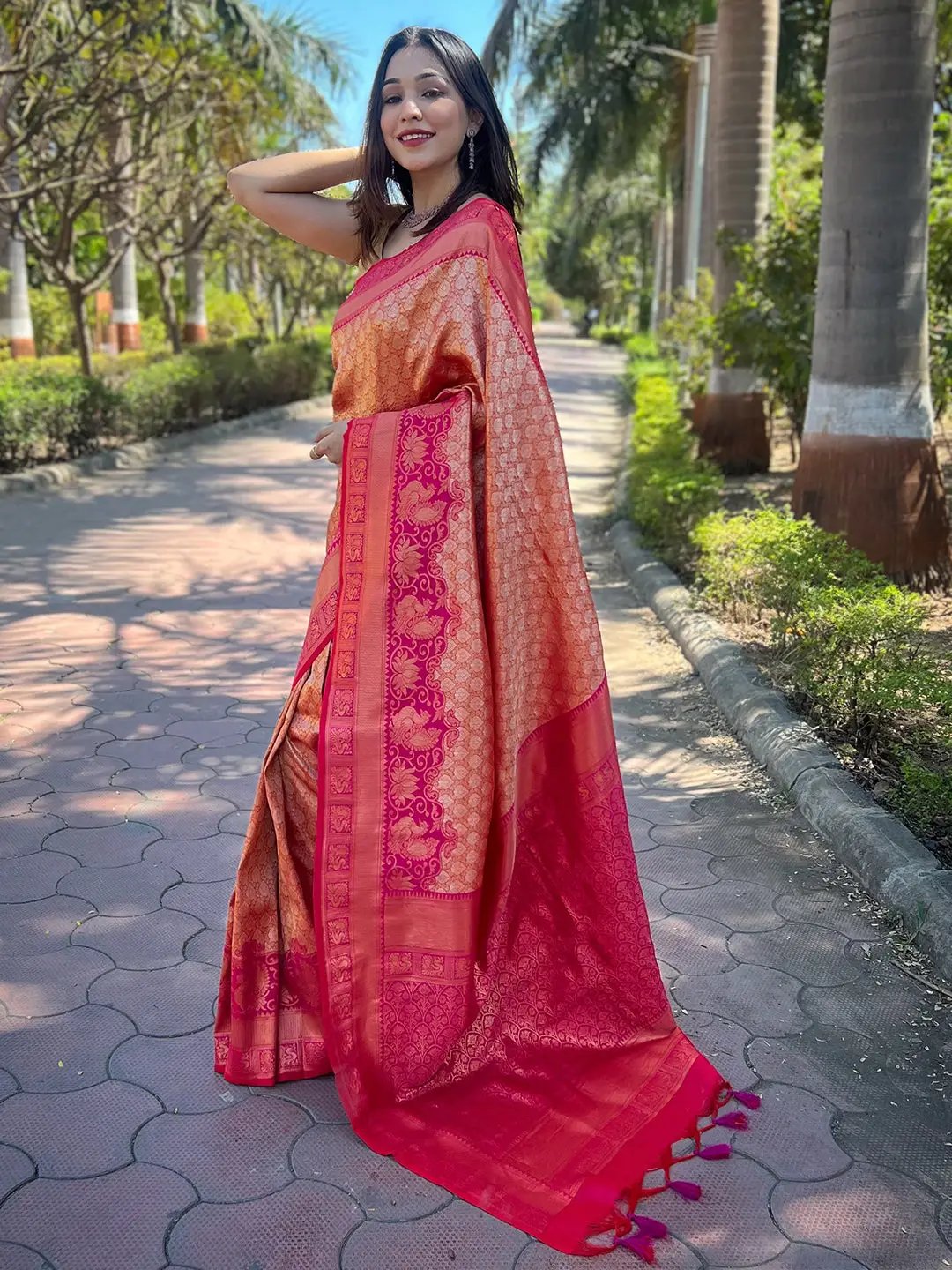 Stylish Kanjivaram saree in gold and pink hues