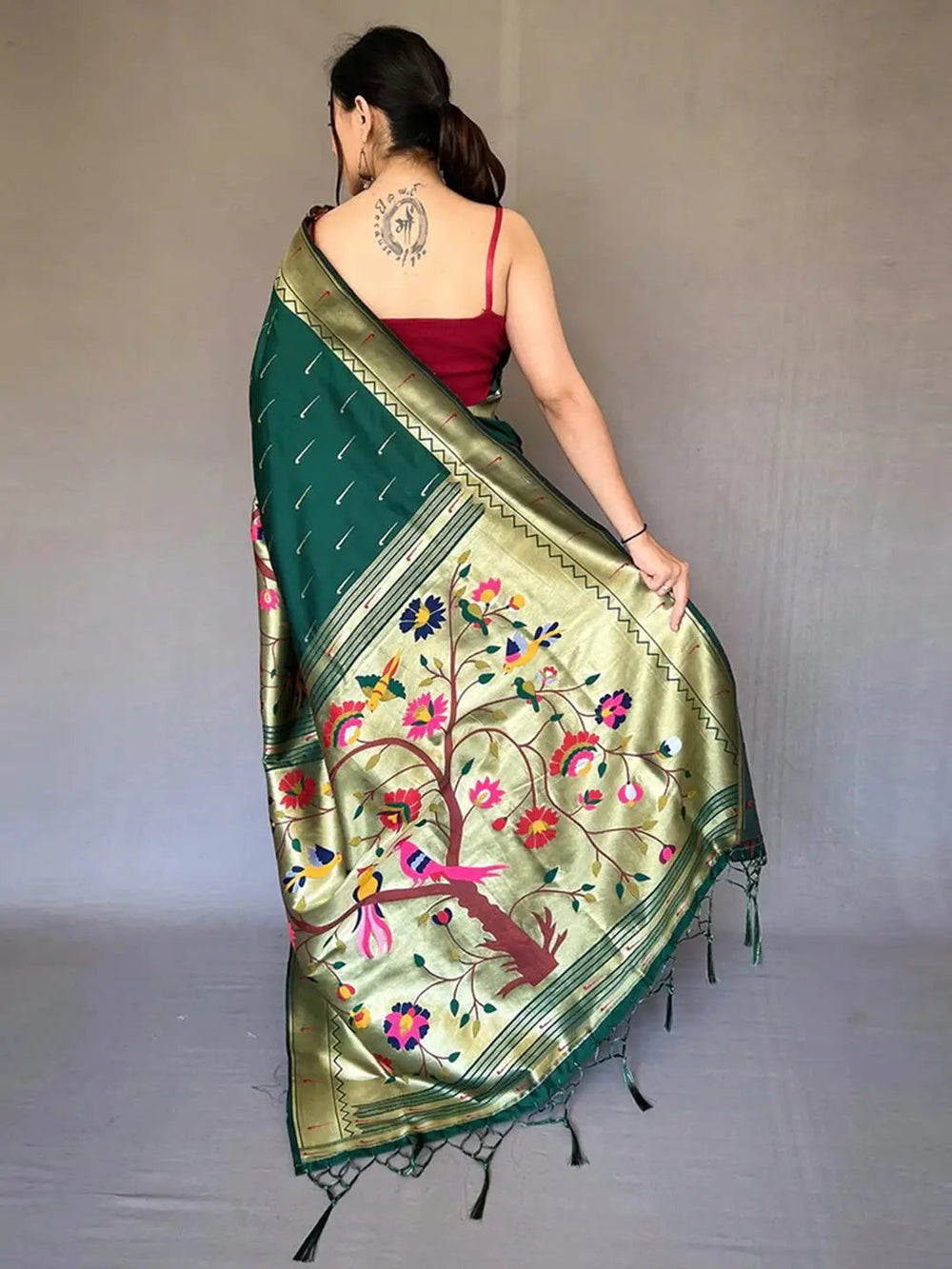 Back view of Bottle Green Paithani saree with intricate zari border