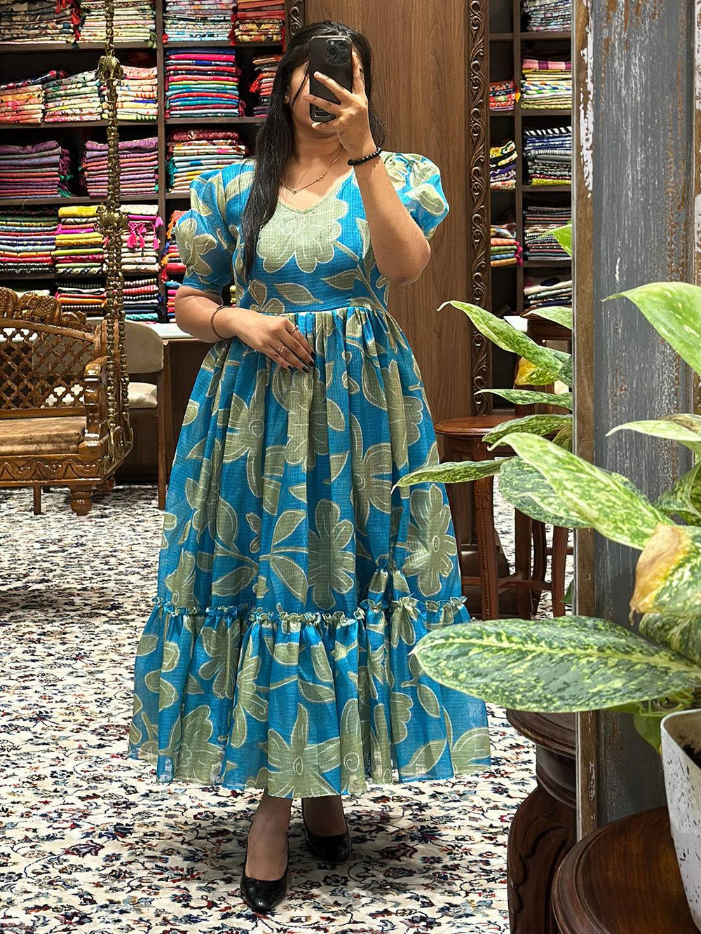 Flattering fit-and-flare teal floral midi dress