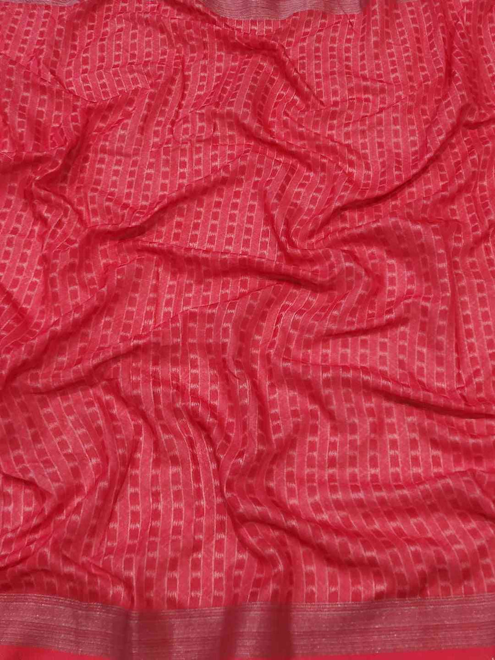 Red Ikkat fabric with subtle striped pattern