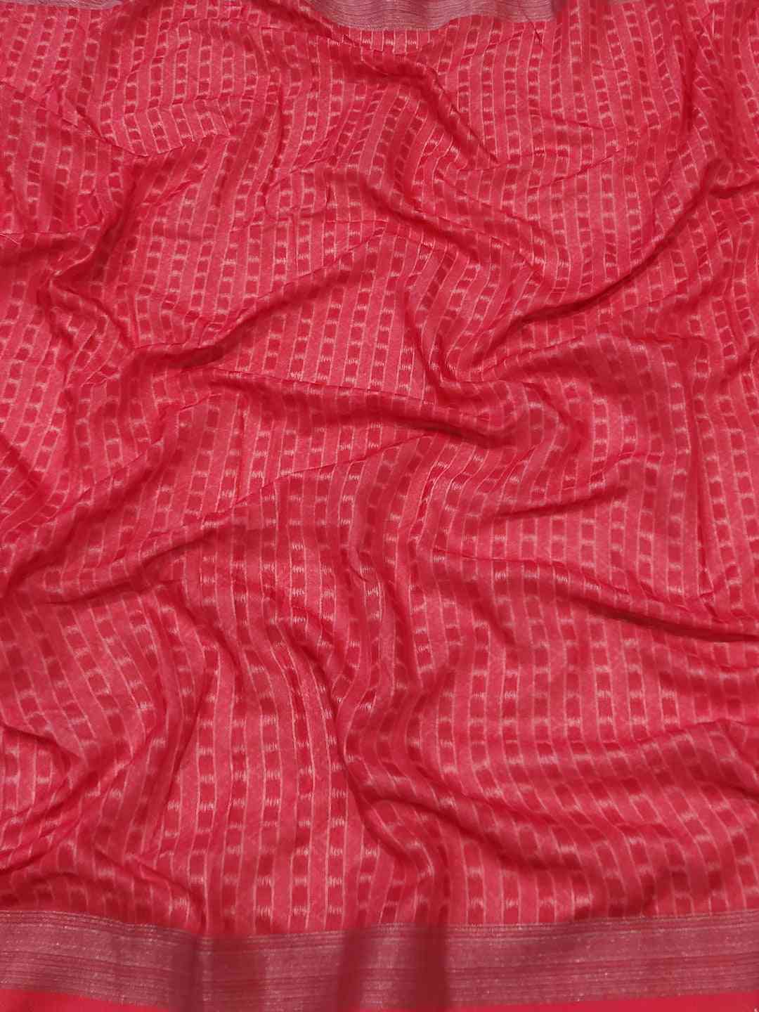 Red Ikkat fabric with subtle striped pattern