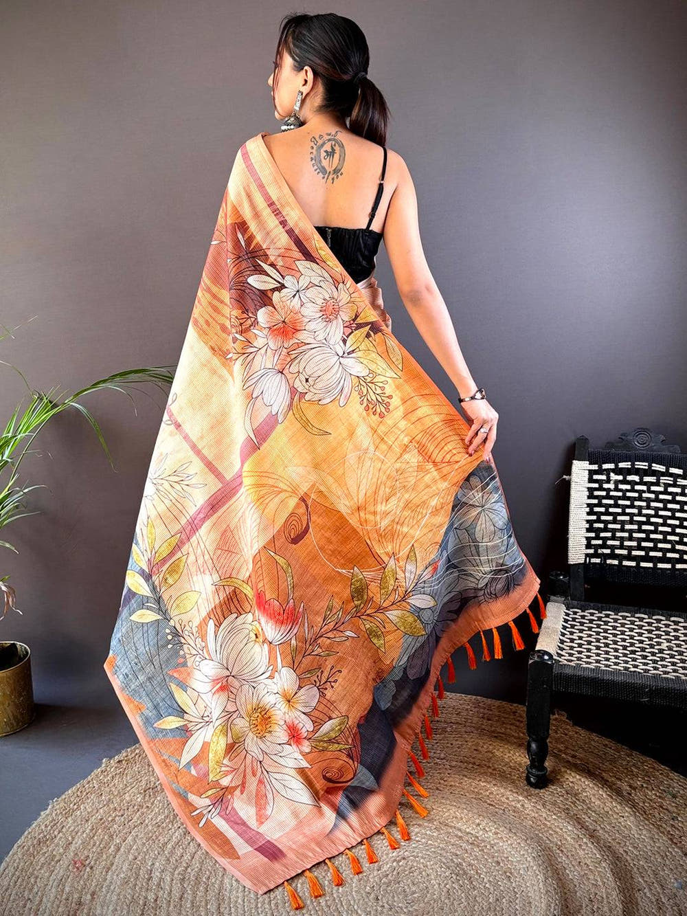 Back view of Light Orange Semi Zari Tussar Floral Saree