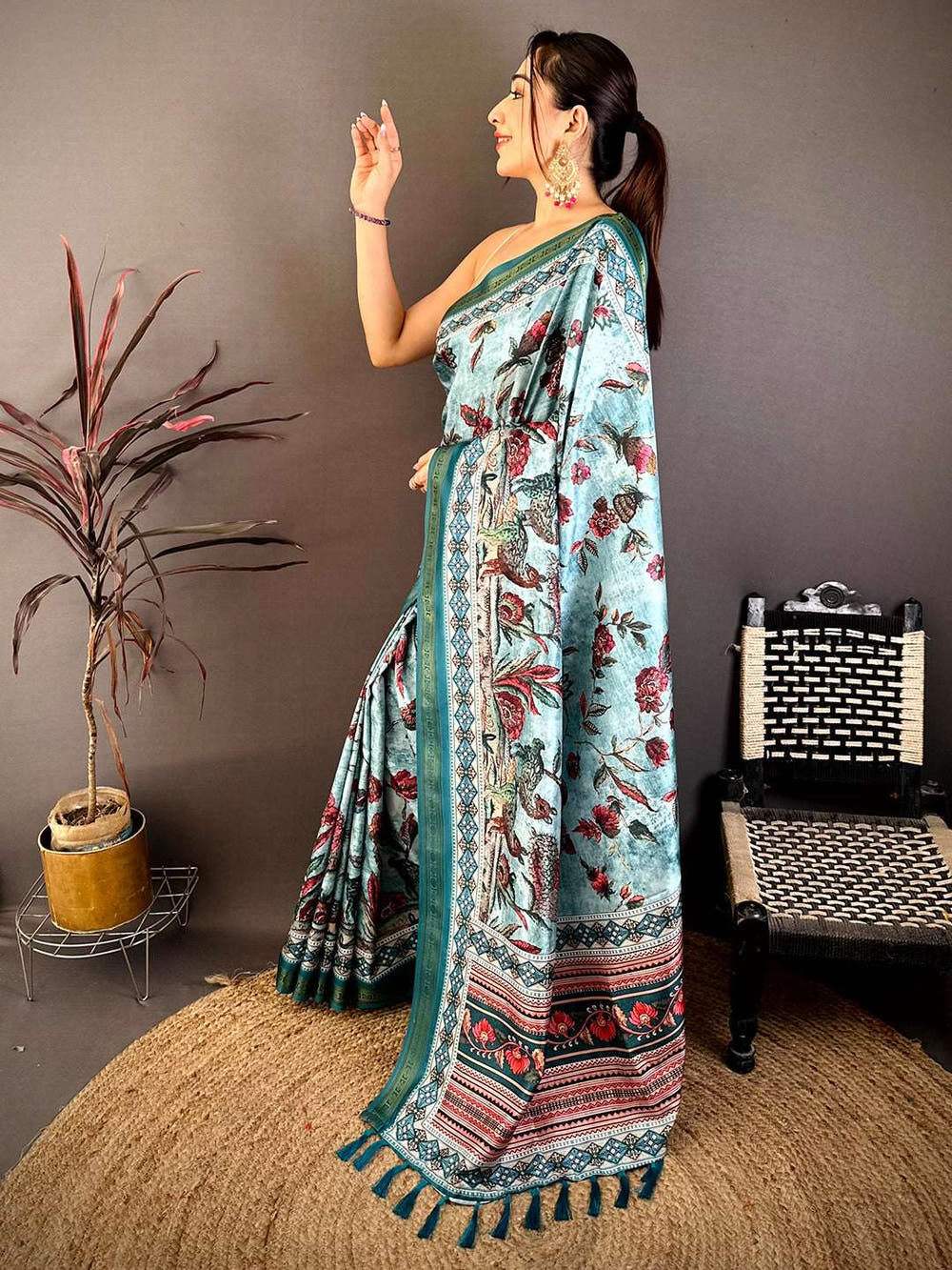 Elegant model showcasing Regal Rudrakh digital print soft silk saree with intricate border design