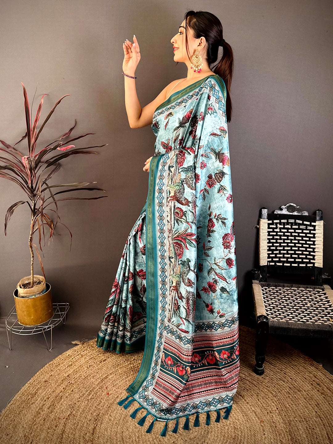 Elegant model showcasing Regal Rudrakh digital print soft silk saree with intricate border design