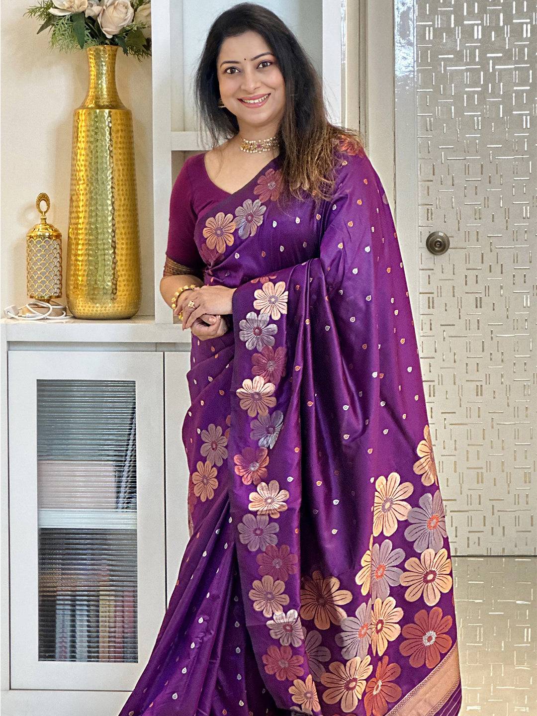 Elegant wine silk saree with intricate zari flowers