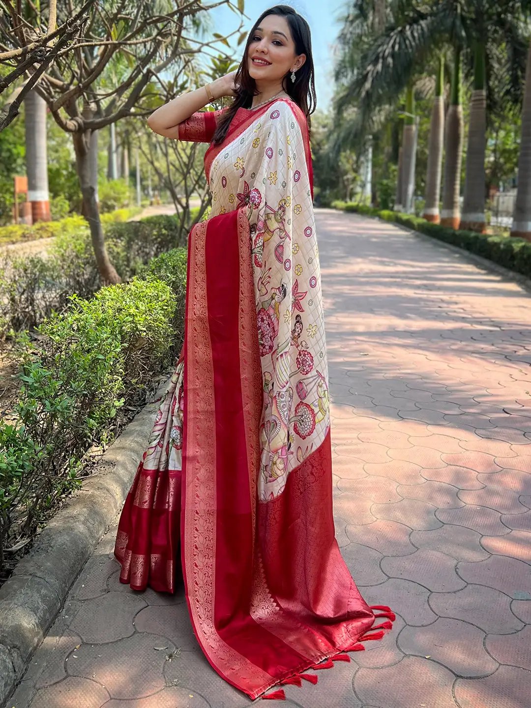 Elegant Banarasi Silk Saree with floral design and red border
