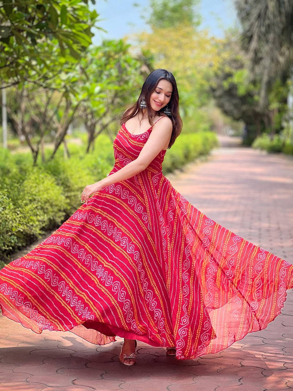 Woman twirling in Rose Red Long Printed Dress