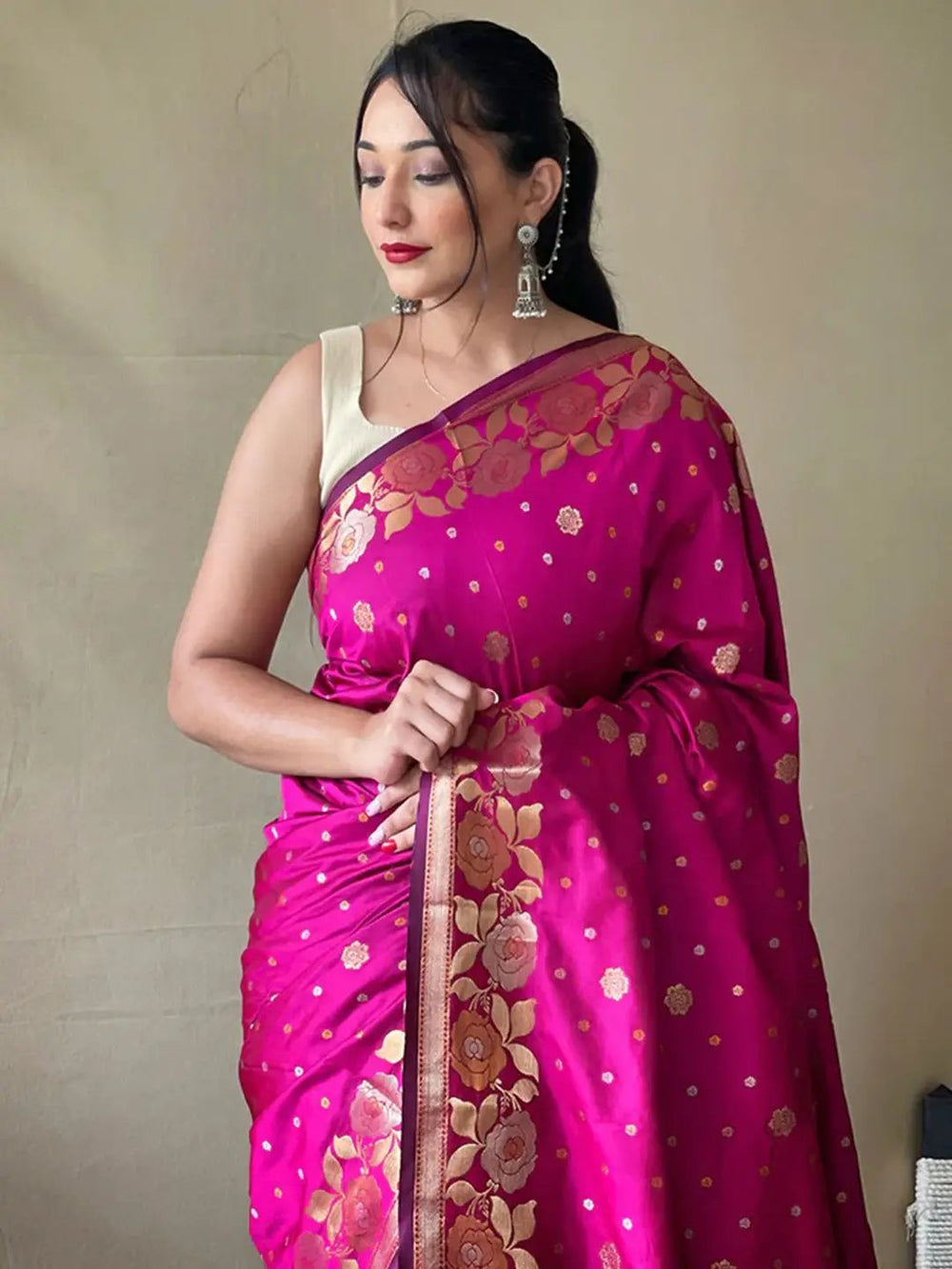 Elegant pink Banarasi silk saree with zari woven design