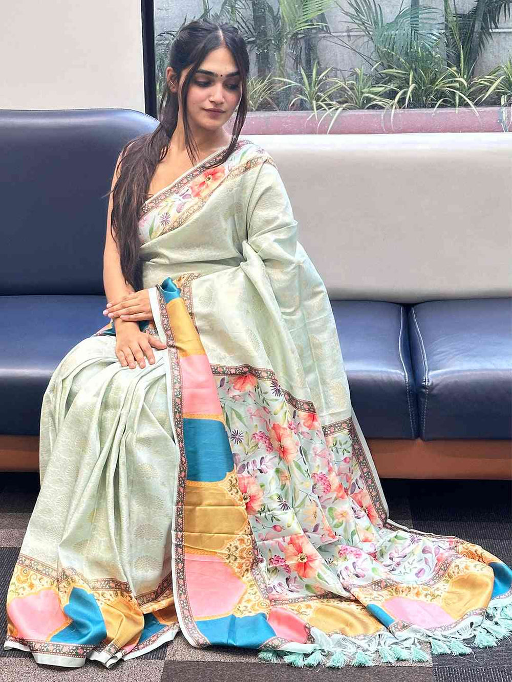 Graceful Banarasi Kanjivaram Saree featuring Mughal floral print