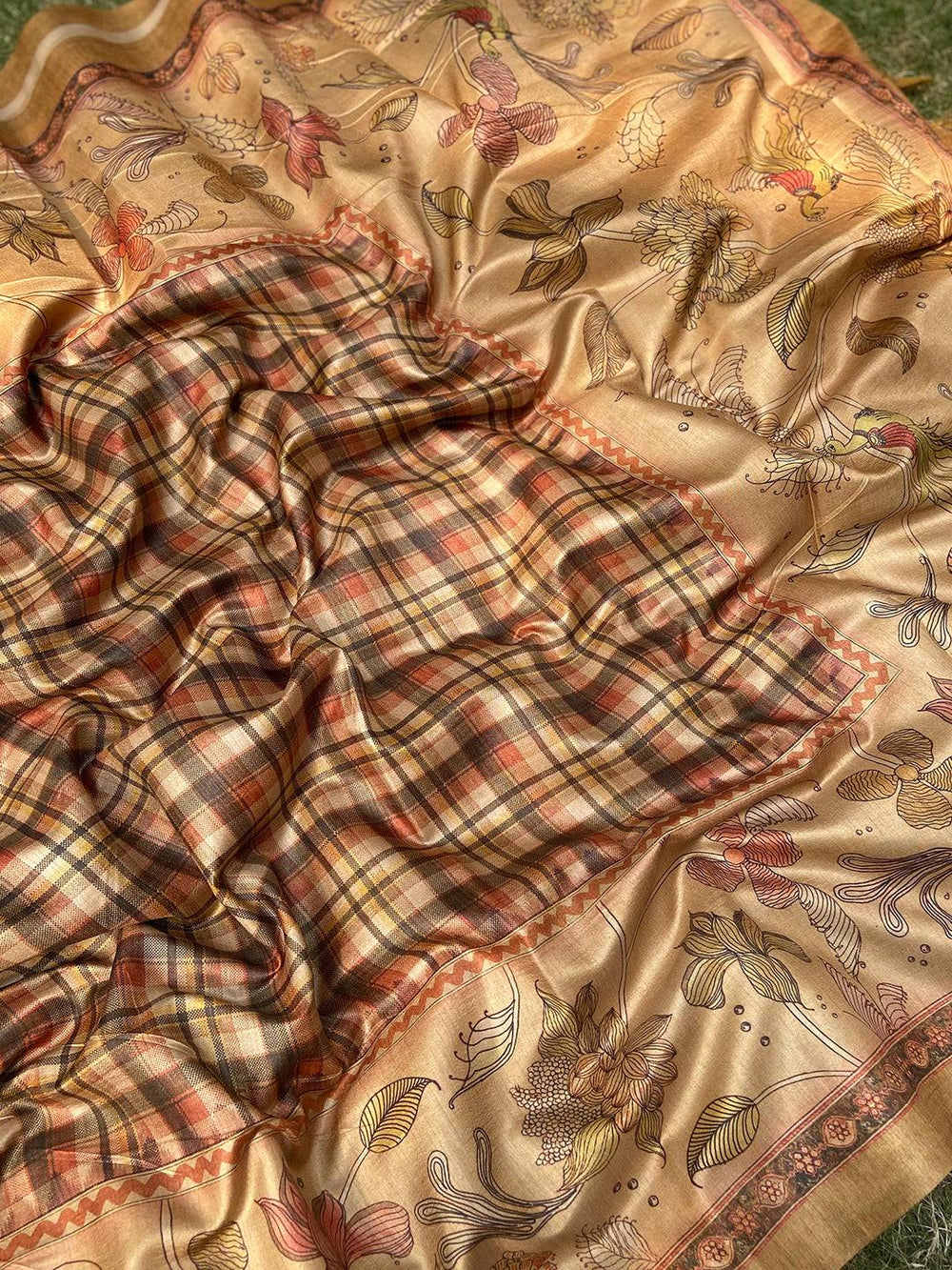 Elegant Kalamkari saree with floral and checked patterns
