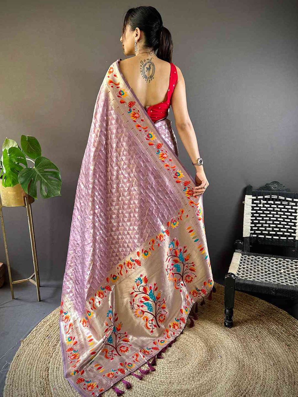 Back view of light wine Paithani saree with floral border