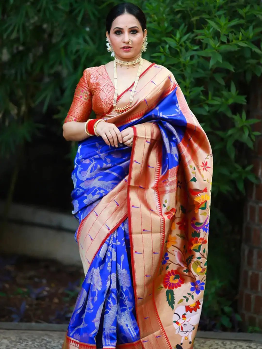 Elegant Paithani silk saree in royal blue with floral pallu