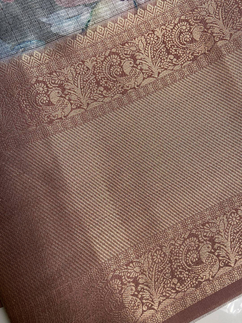 Gold zari border detail on Pista Kota Doriya saree