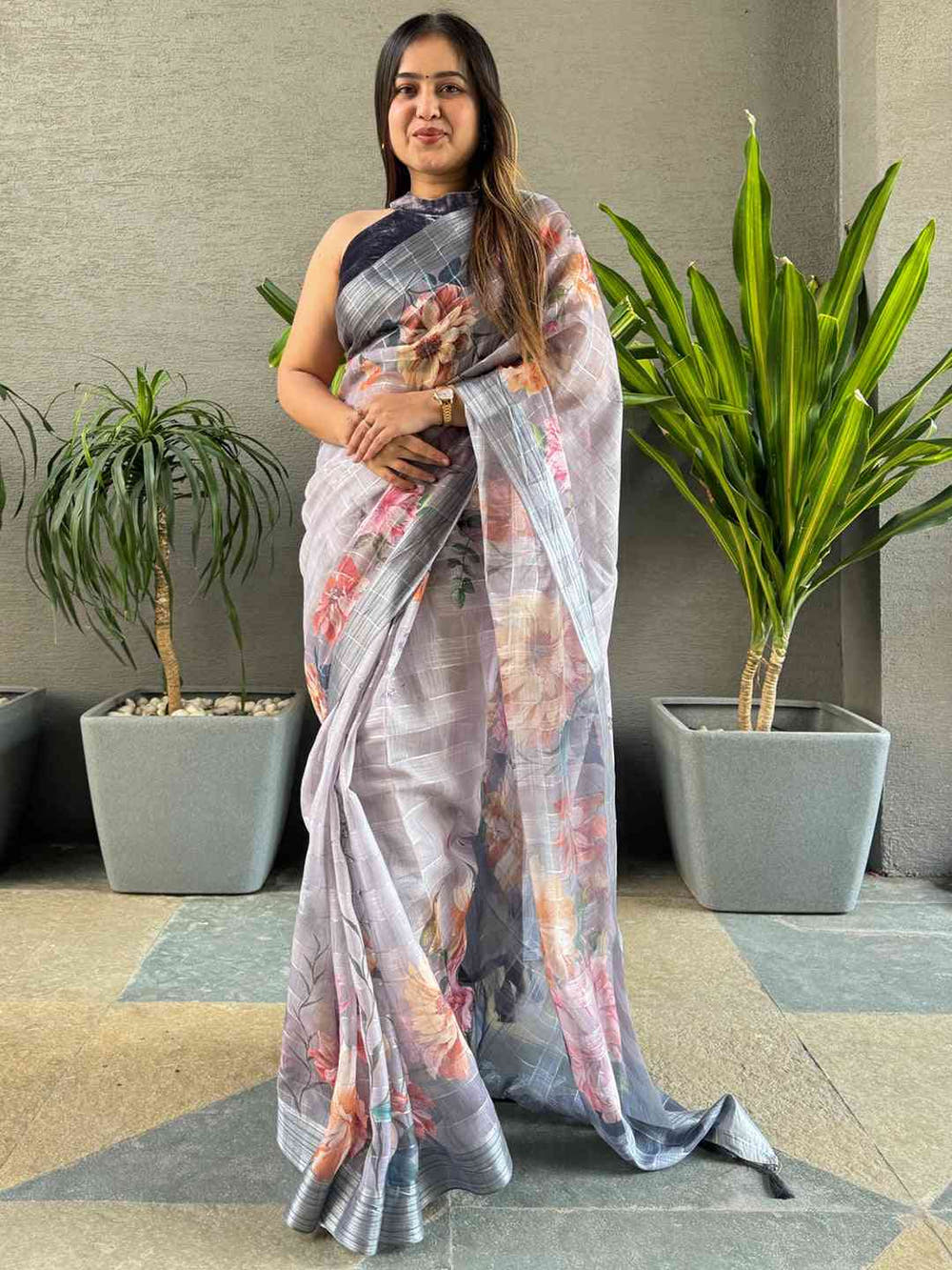 Grey saree with floral design and self zari chex weaving