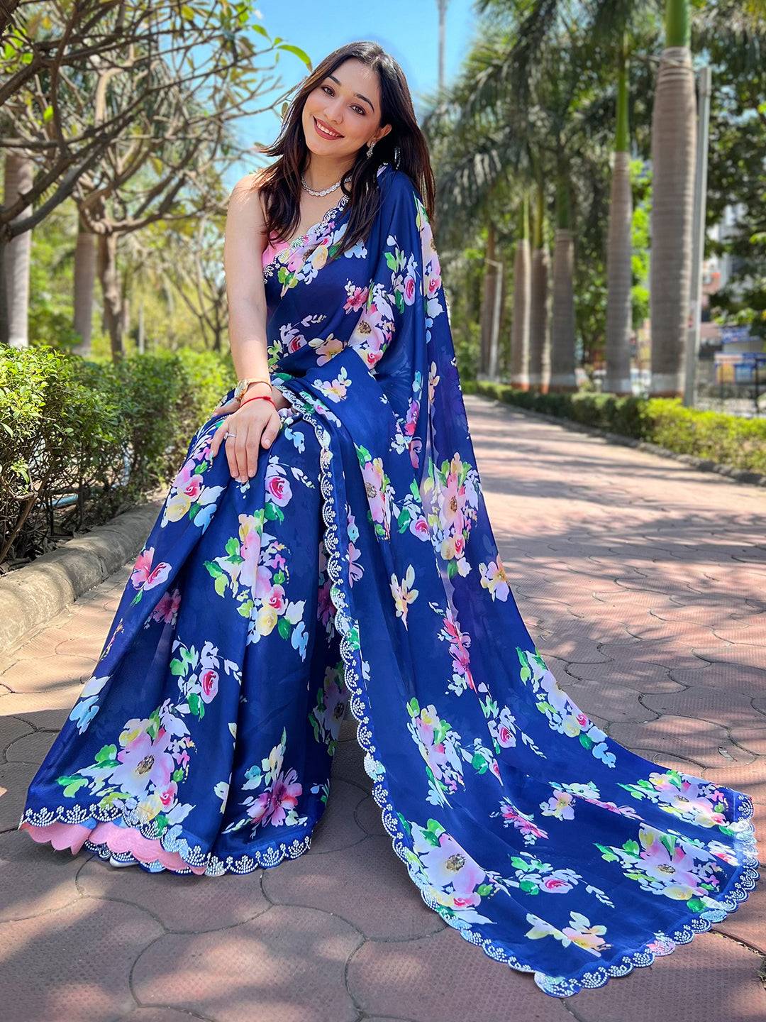 Navy floral georgette saree for festive occasions