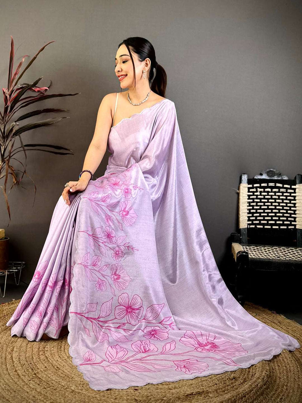 Lavender floral cutwork saree with chiffon fabric and pink floral print