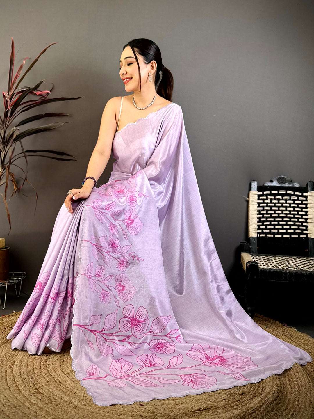 Lavender floral cutwork saree with chiffon fabric and pink floral print