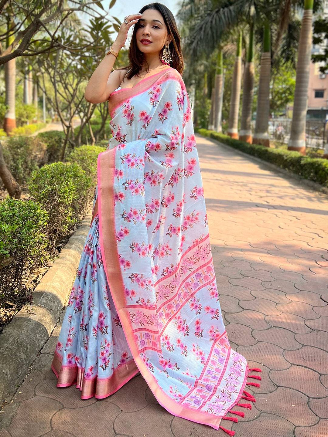 Elegant light blue Kota saree with pink floral design