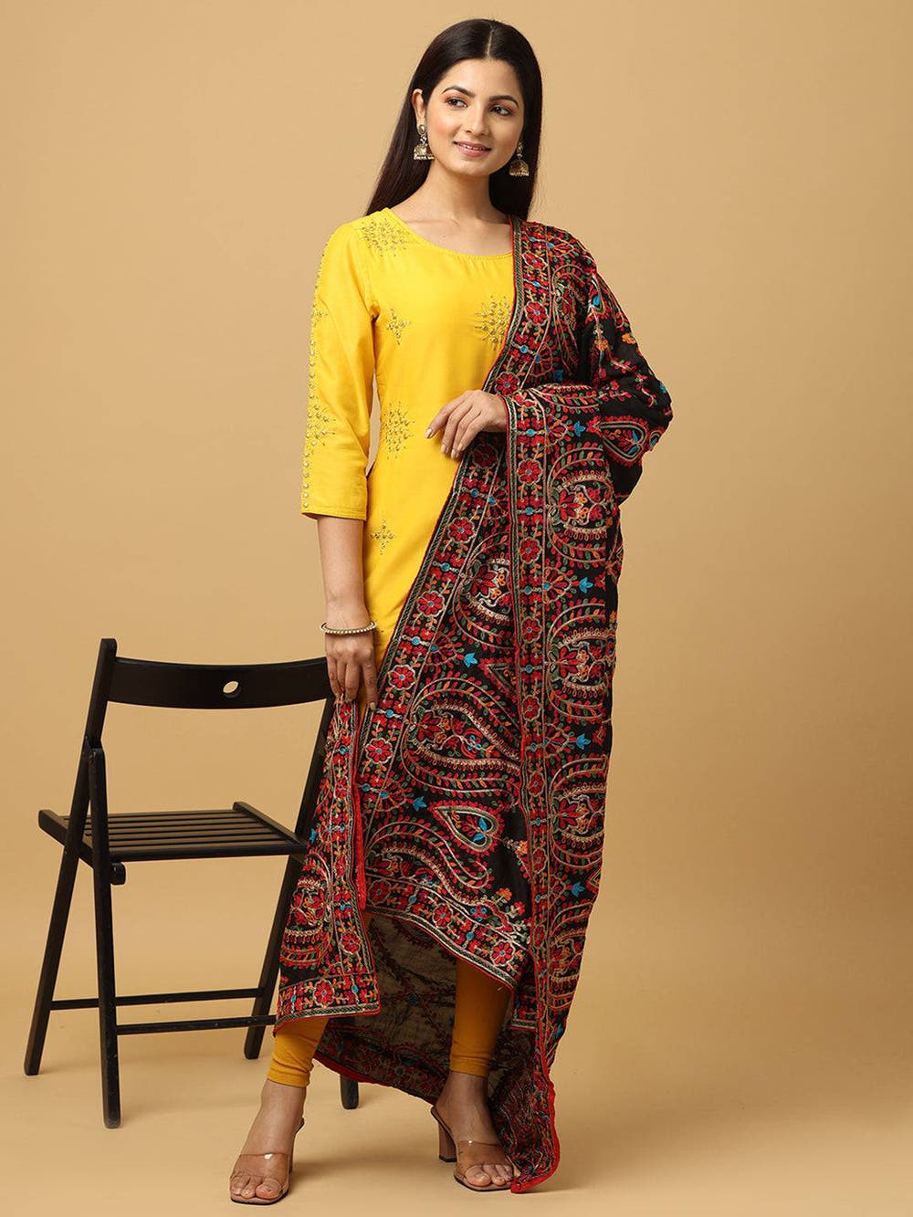 Model showcasing black pashmina dupatta with embroidery