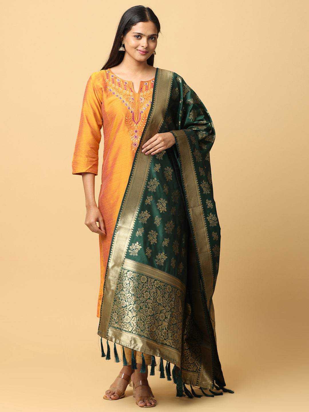 Model wearing dark green silk blend dupatta