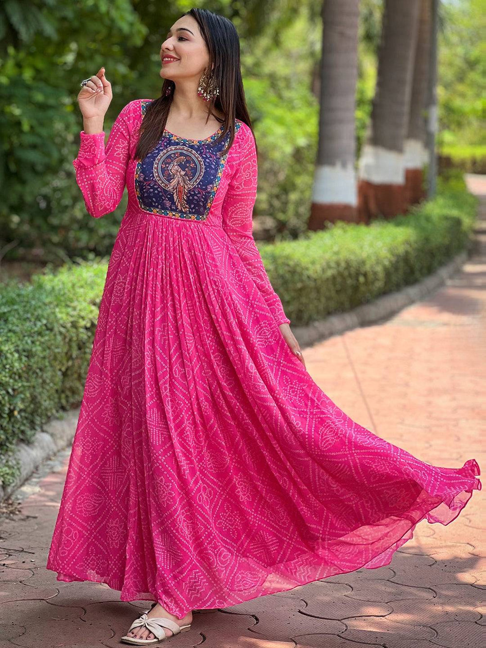 Deep pink Bandhej print dress with round neck design.