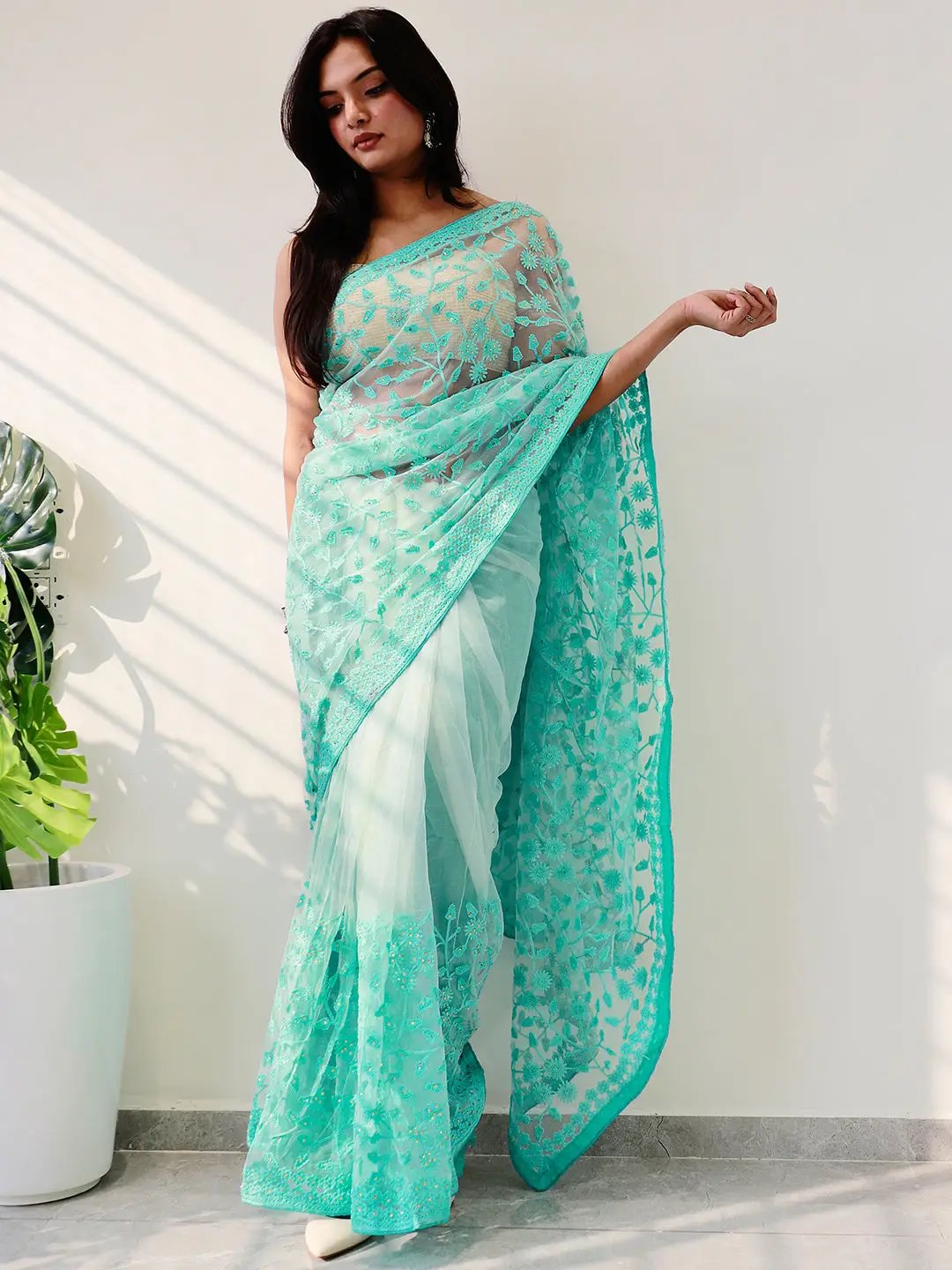 Elegant Saree Adorned with Ethnic Motifs, Intricate Threadwork, and Embellished Borders Unstitched Net Sky Blue