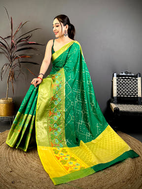Green Katan Silk Ikkat Saree with intricate border and traditional design
