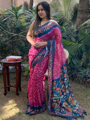 Model wearing pink Bandhej Kalamkari Saree outdoors Vastranand 