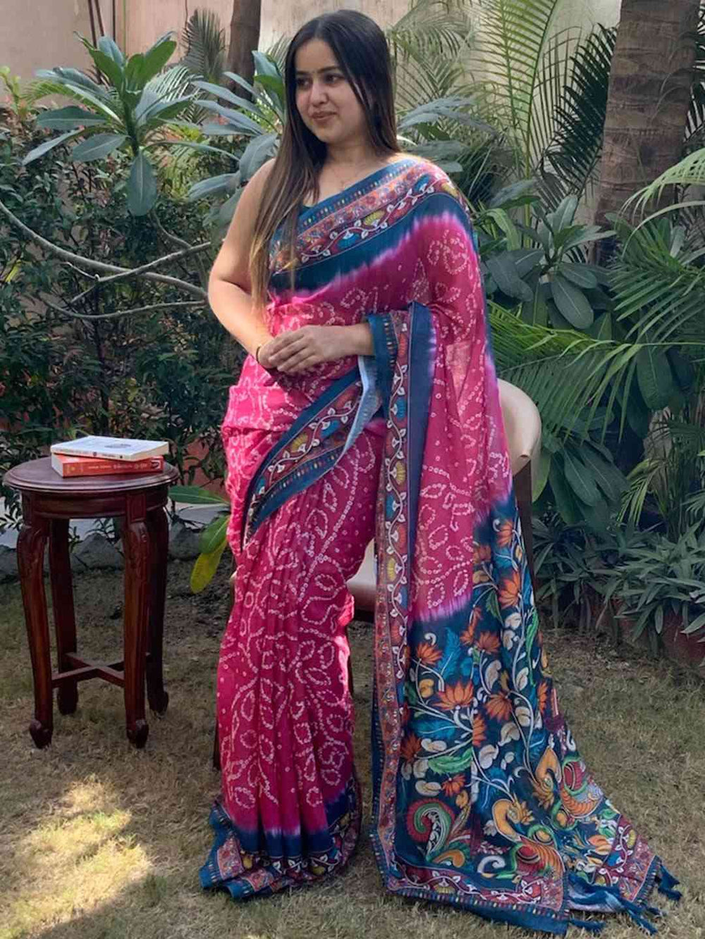 Model wearing pink Bandhej Kalamkari Saree outdoors Vastranand 