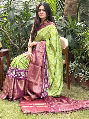 Green silk Bandhej saree with pink Pattu Zari border