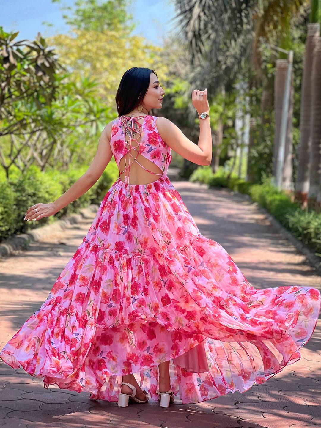 Back view of neon pink floral dress with lace detail