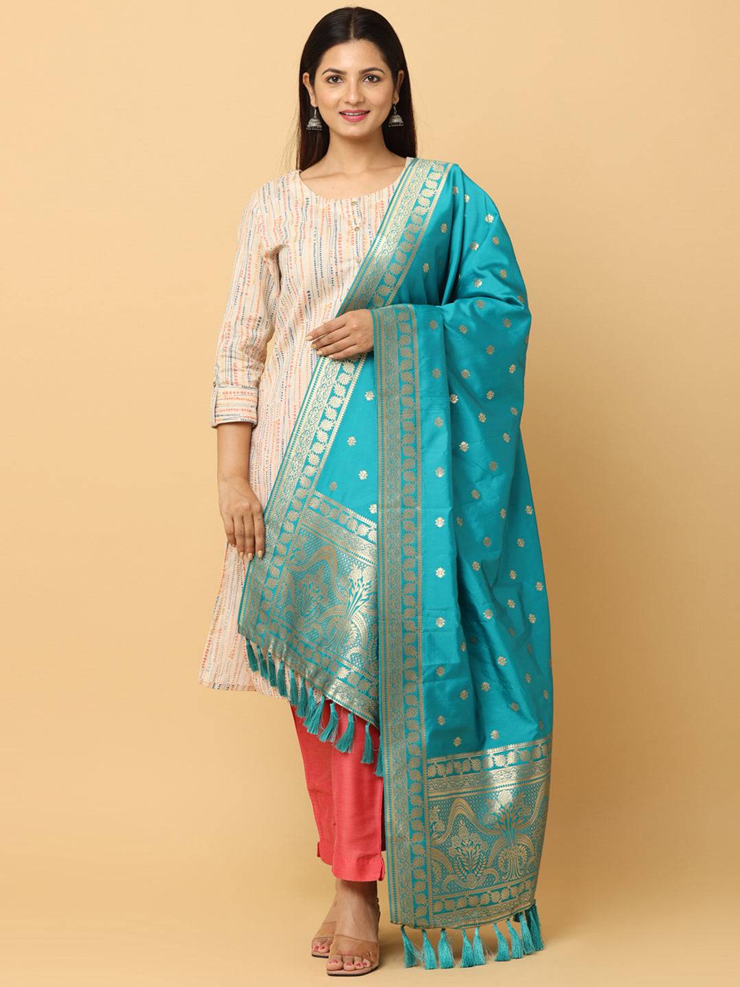 Model wearing turquoise silk blend dupatta with resham tassels