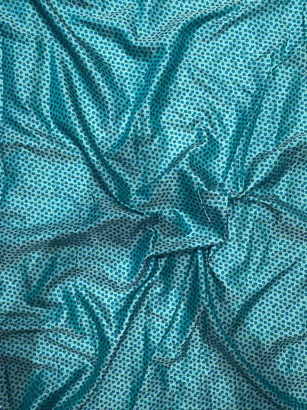 Blue patterned silk fabric with intricate design