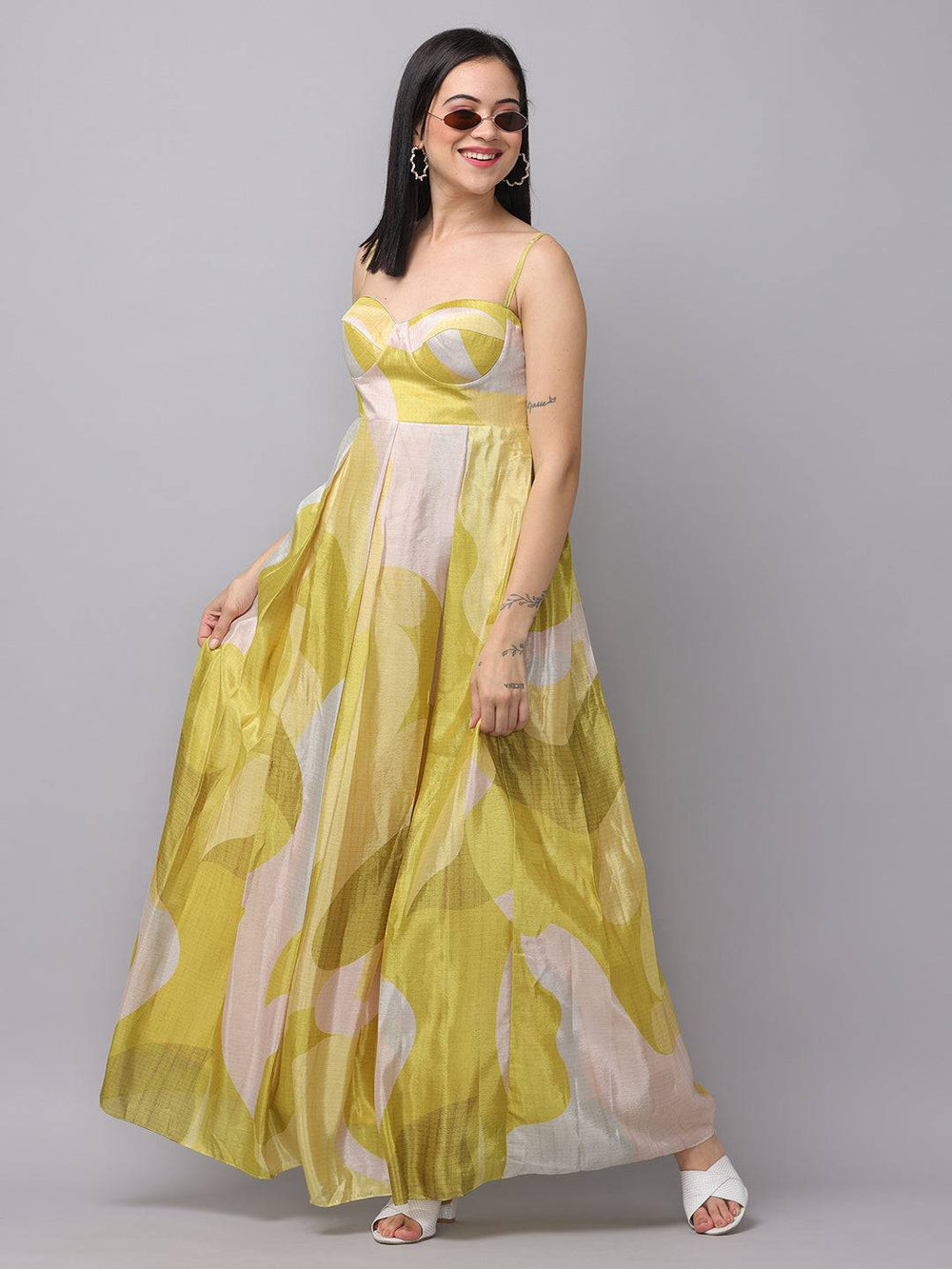 Model twirling in Spring Green Abstract Print Dress