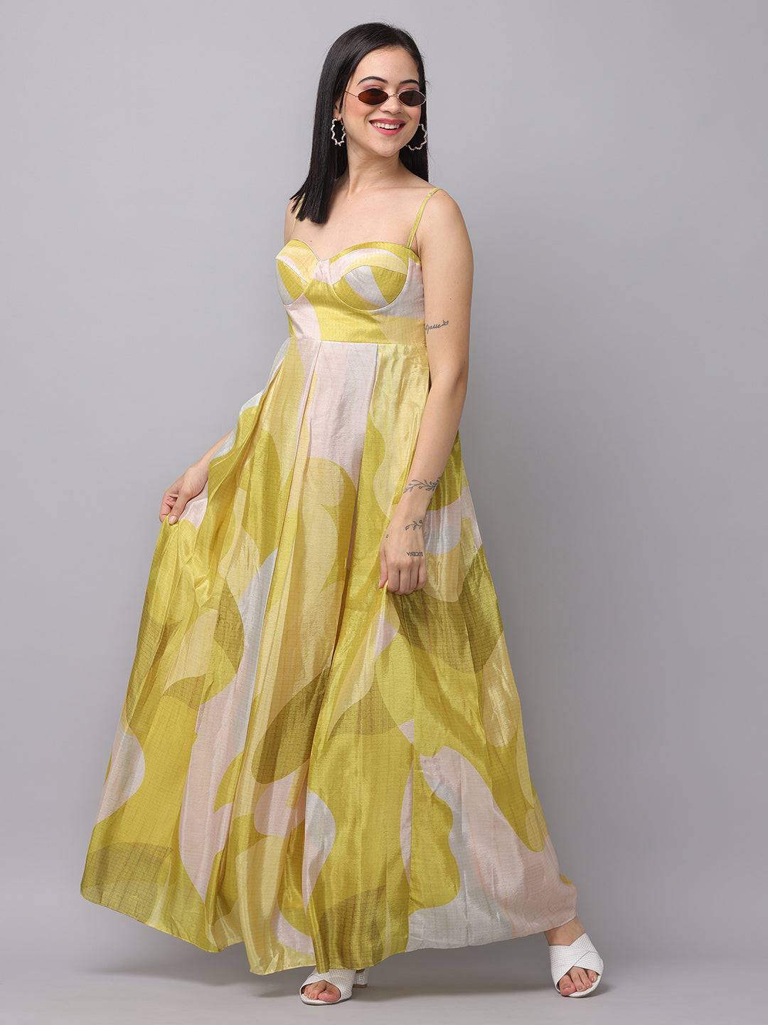 Model twirling in Spring Green Abstract Print Dress
