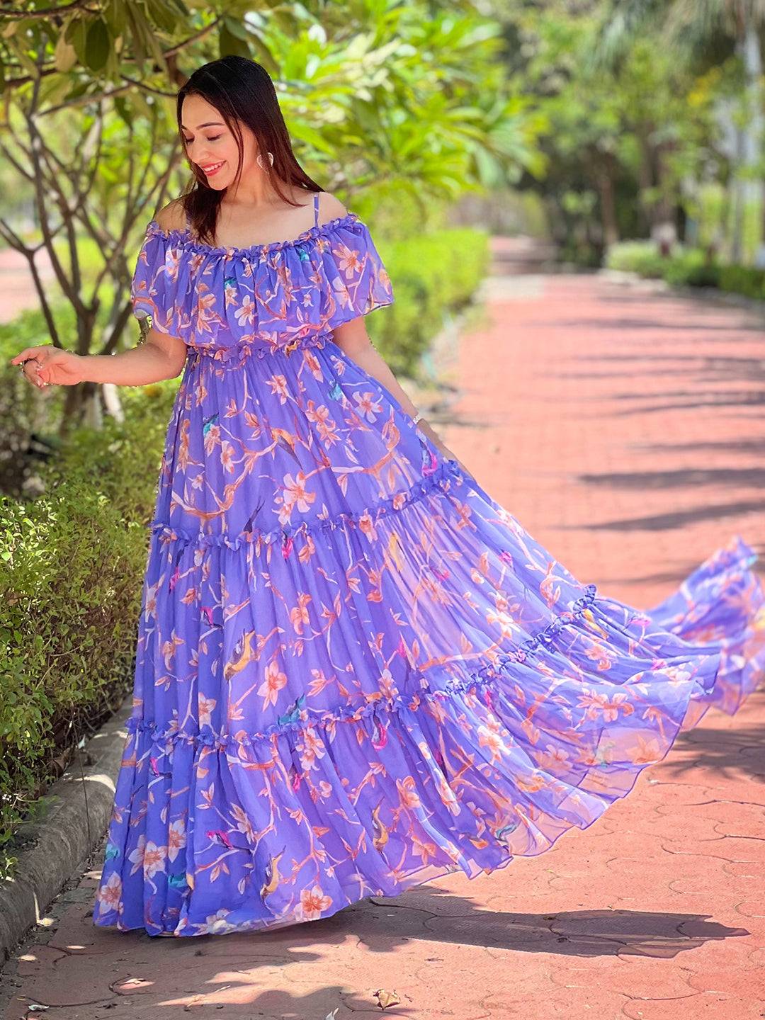 Woman in Purple Martini Floral Maxi Dress outdoors