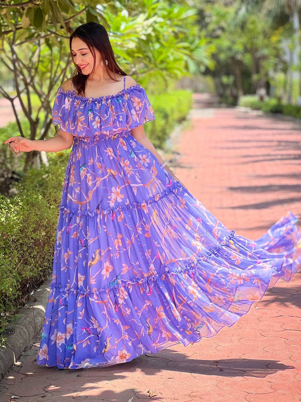 Woman in Purple Martini Floral Maxi Dress outdoors